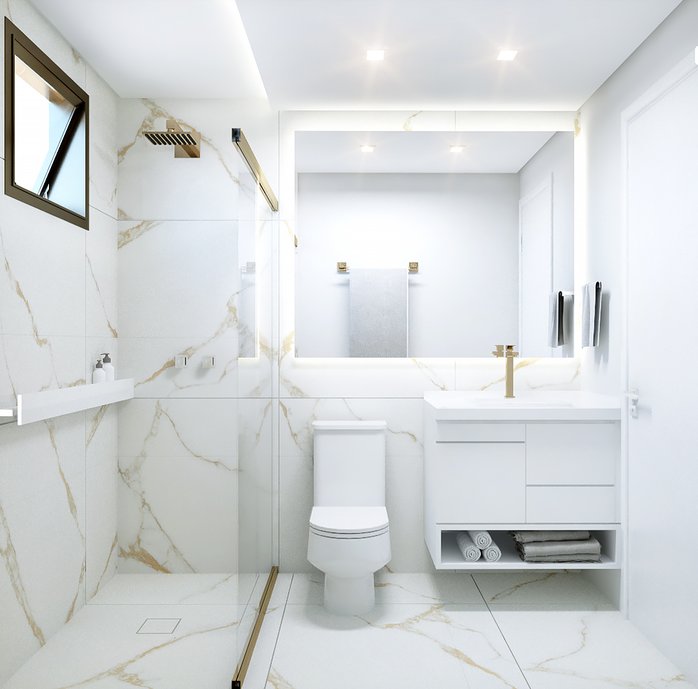 Banheiro clean e sofisticado, com acabamentos dourados (metais) para compor com os veios do porcelanato