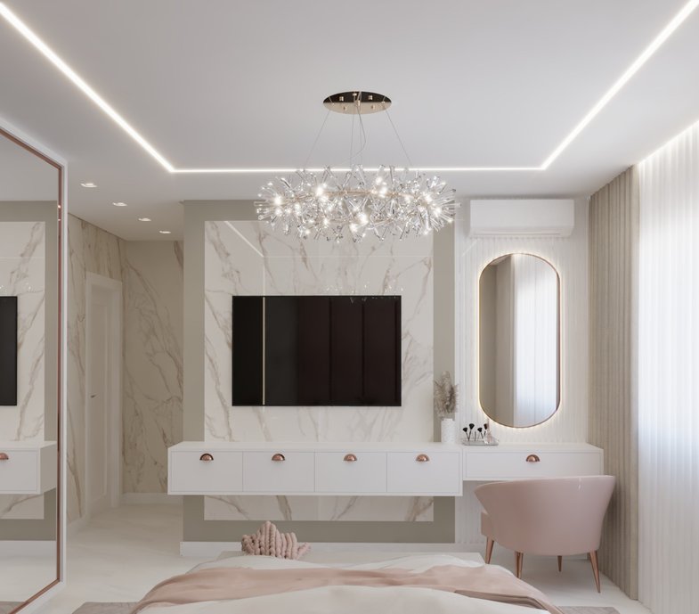 Uma Suíte com decoração delicada e soluções funcionais. O armário espelhado aumentou a percepção de tamanho do ambiente. E o espelho da penteadeira ganhou um formato arredondado mas não perdeu a iluminação indireta para auxiliar na hora da make.