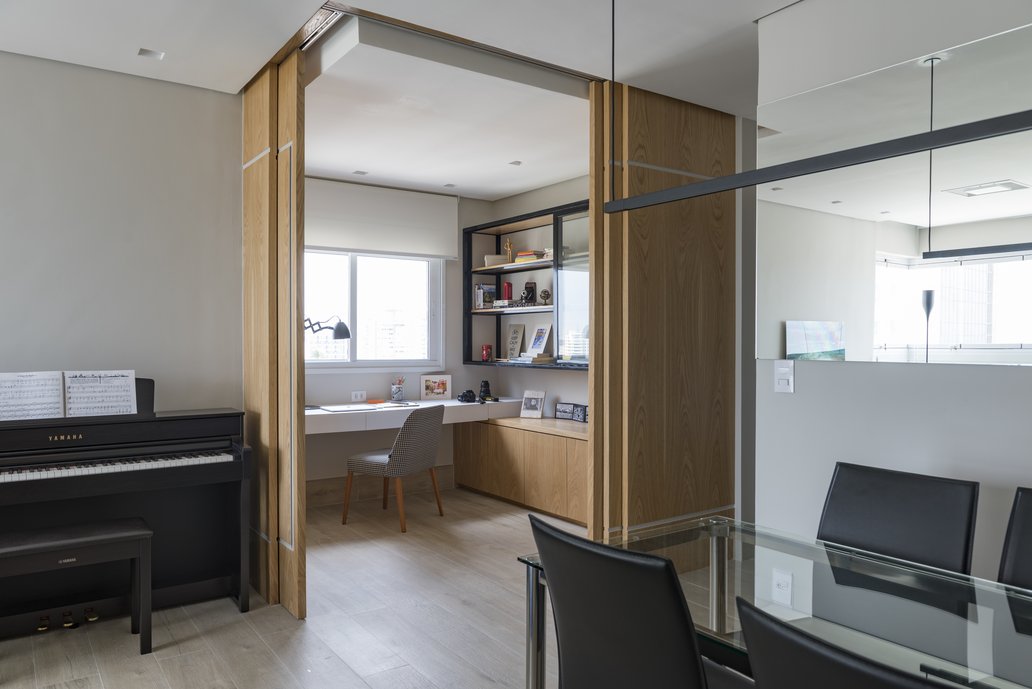 O segundo quarto deu função ao home office integrado à sala