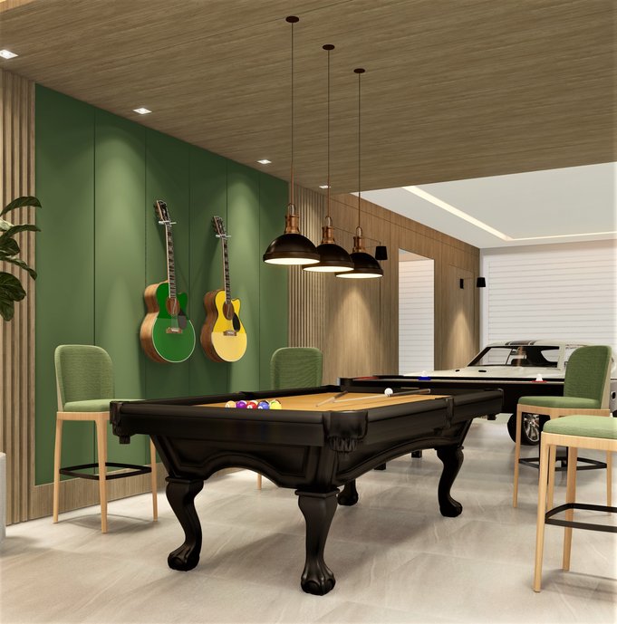 #ConcursoArchtrendsCasoca. O Projeto sala de Jogos DJ é um espaço para família se divertir e descontrair, visto que o casal adora estar junto dos filhos, jogar sinuca, air hockey e tocar violão. A família também compartilha da paixão por carros antigos, sendo o espaço projetado para expor um deles. O ambiente utiliza o porcelanato MS.Barcelona Acero acetinado que agrega-se na proposta para uma atmosfera mais escurecida, dispondo luzes focais no locais de jogos. O uso da cor verde e do teto rebaixado em madeira certificada proporciona uma setorização funcional para o espaço horizontal. Esse ambiente também visa a sustentabilidade para o dia a dia, que prevê o uso de energia fotovoltaica e Iluminação natural com o uso de duas portas-janelas.