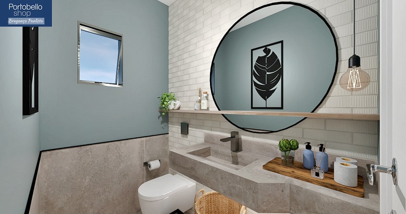 Lavabo com materiais em concreto e tons pastéis.