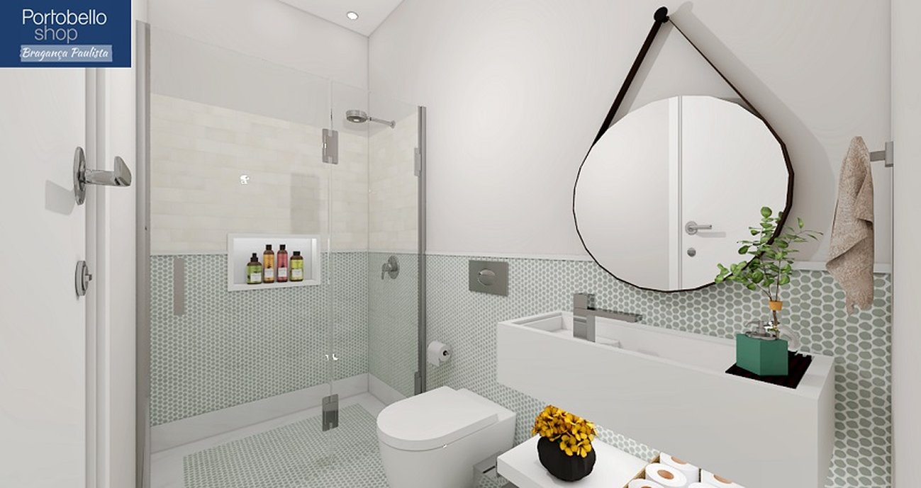 Banheiro moderno com detalhes coloridos, em tons claros. 