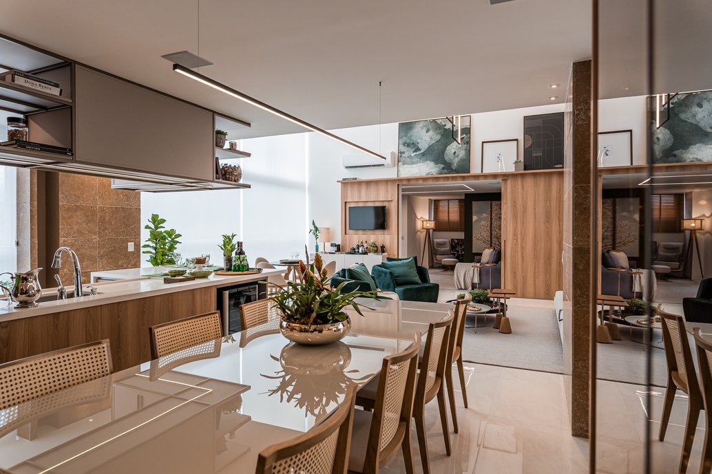 apartamento totalmente reformado criando amplo espaço social e integração total entre ambientes de Estar, Jantar e Cozinha. Inteiramente revestido com Onyx Unique. Fotografias: La Rampa Filmes