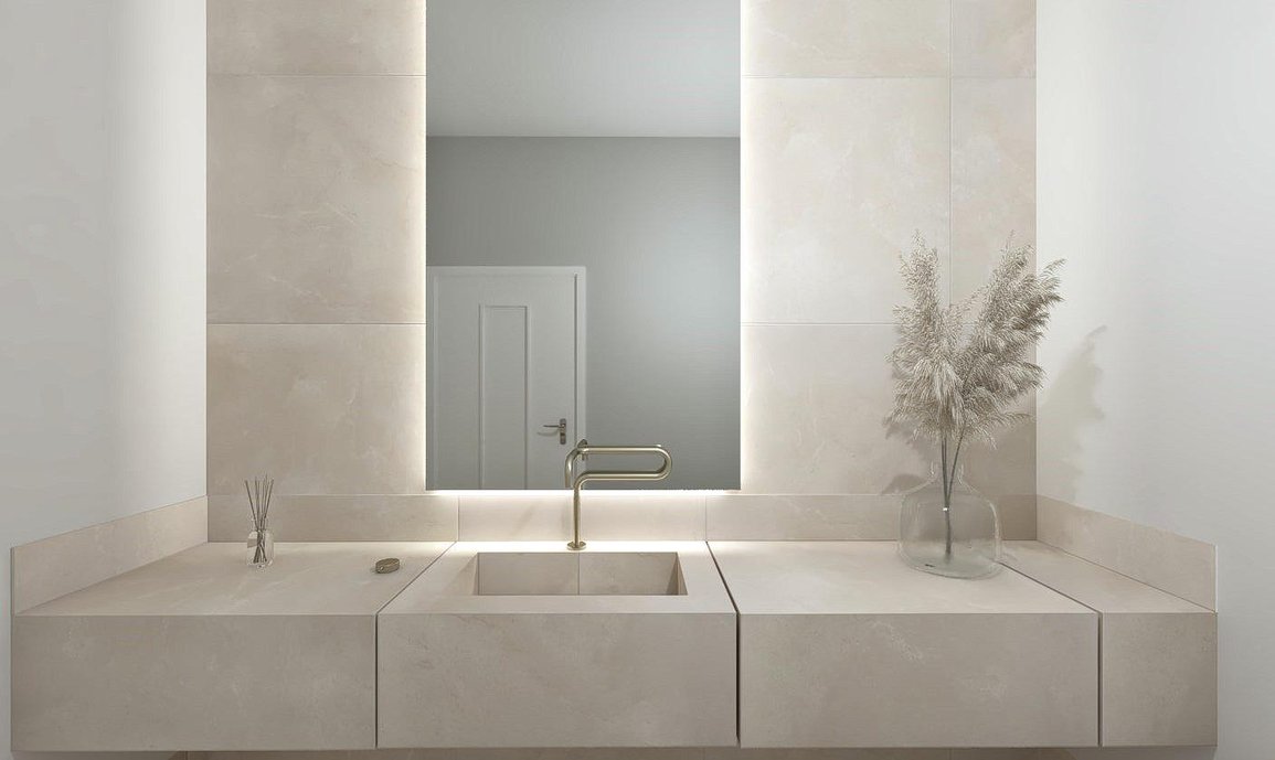 A aposta para este lavabo foi utilizar dos detalhes de metais e corte especial em composição com uma proposta de revestimento clássica. 