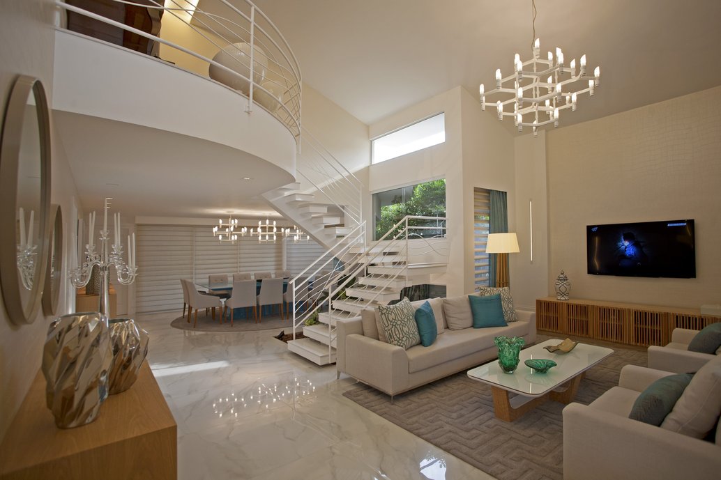 Living com Bianco Covelano 60 x 120 polido trouxe harmonia para o projeto além de muita sofisticação.