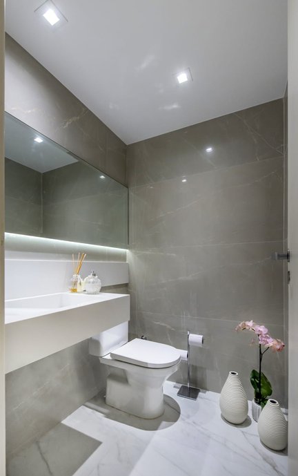 lavabo com piso, revestimentos e bancada em porcelanato