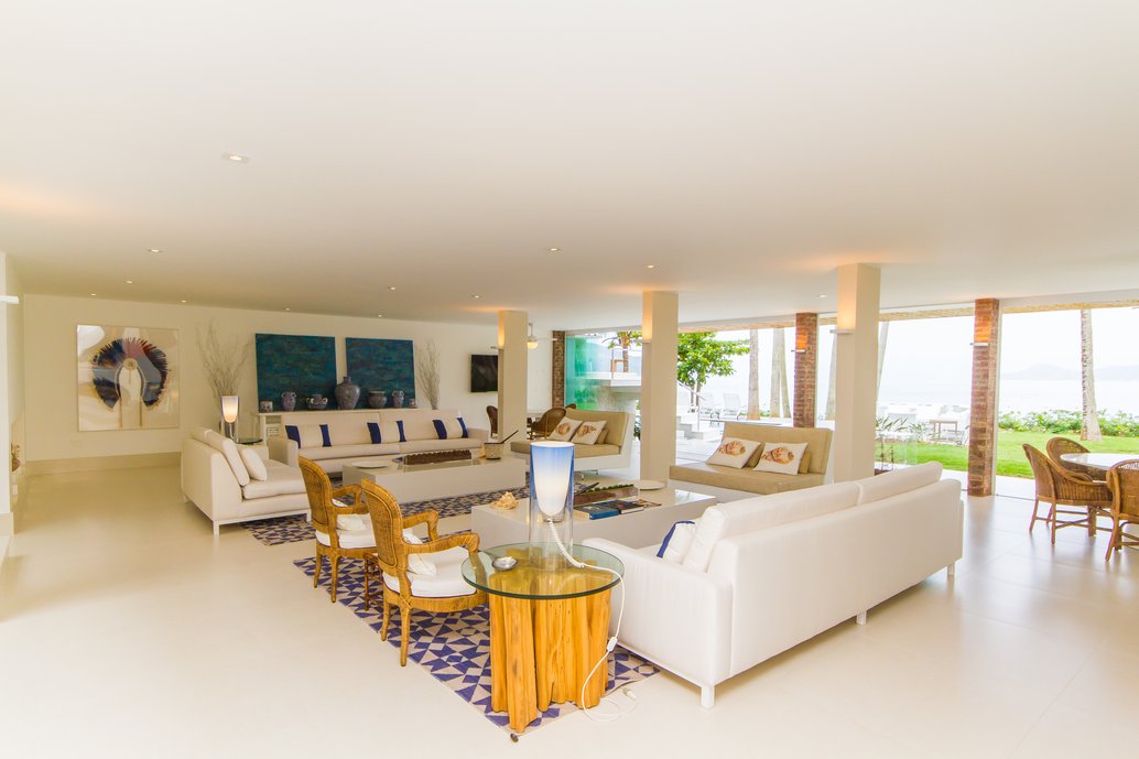 Projeto de casa de praia com ambientes totalmente integrados. Menos paredes, mais integração, luz natural e melhor ventilação.