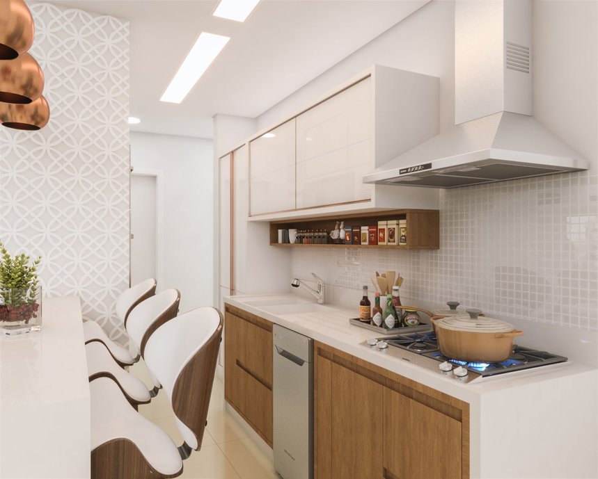 Na cozinha integrada a escolha de materiais segue a mesma linha do living, trazendo harmonia e leveza ao decor.