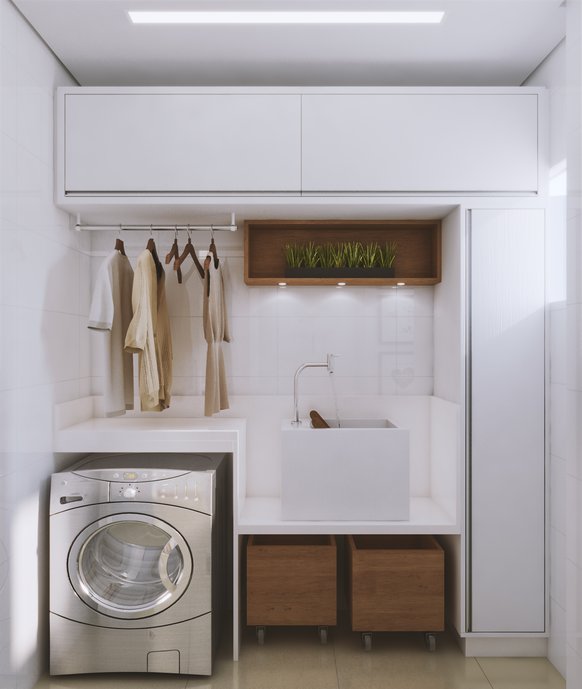 Uma solução muito prática e que economiza espaço é usar o tanque de louça de sobrepor. E para completar, caixas com rodízios para colocar as roupas sujas.