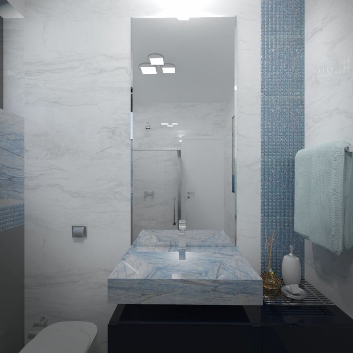 Banheiro assinado pela arquiteta mineira Jéssyka Teles, emprega o porcelanato Azul Boquira na cuba, de cortes especiais Portobello Shop, e detalhes no ambiente, em conjunto com o Carrara Bianco 60x60 e a belíssima pastilha Gioielli Ametista 1,5x1,5.