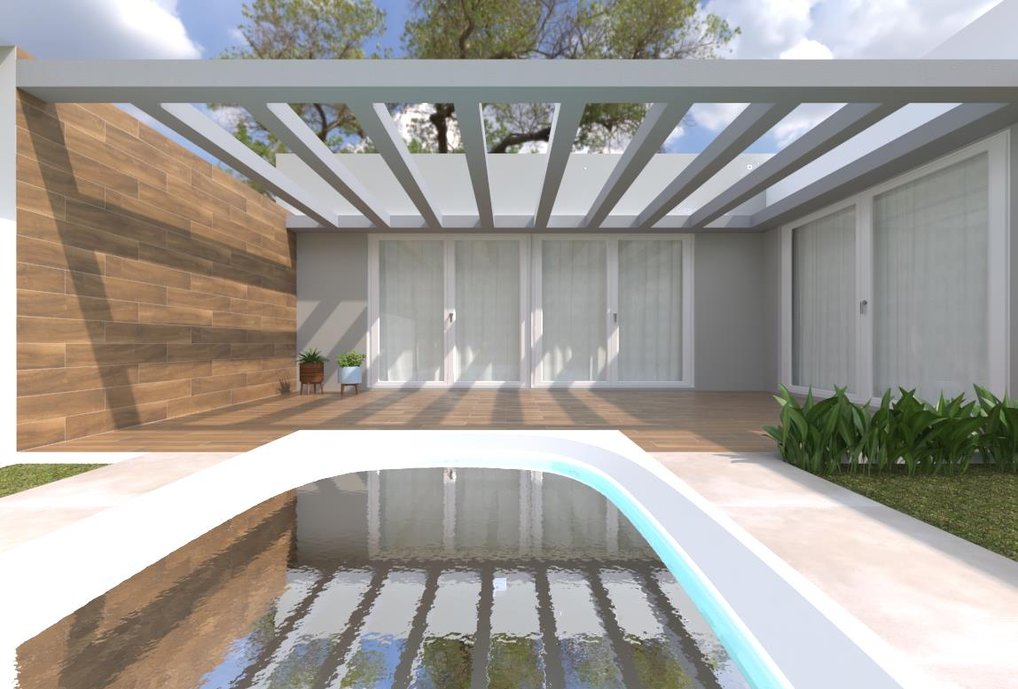 Área de lazer com piscina projetada para família aproveitar nos dias de calor. No piso, as tábuas de madeiras interpretadas em porcelanatos dão um toque rústico e sofisticado ao espaço.