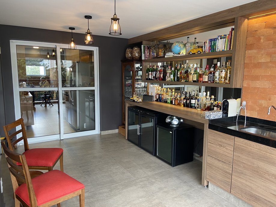 Bar integrado com terraço gourmet