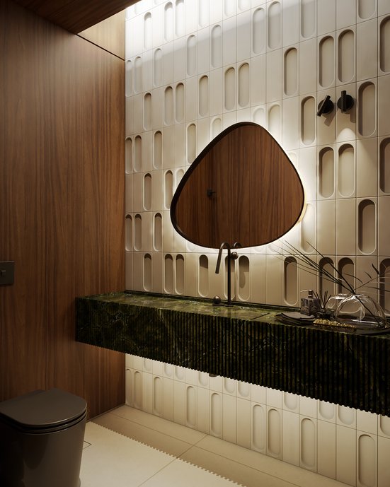 Lavabo social, piso Via Durini Off White, revestimento Pi planos e côncavos, bancada em Vitória Régia.