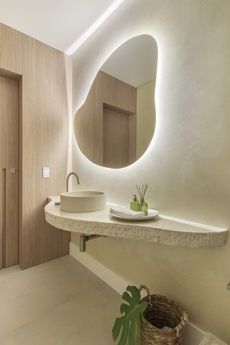 Lavabo com proposta leve e orgânica, poucos elementos, mas elementos naturais que trazem personalidade e aconchego.