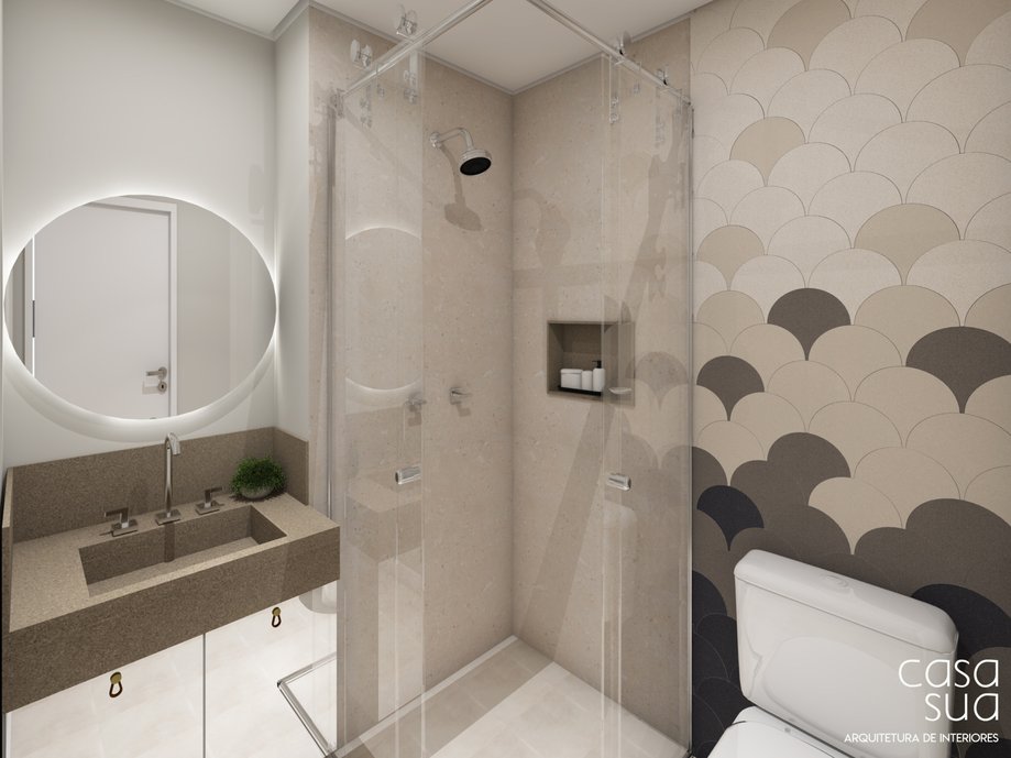 Banheiro marcado pelos tons neutros e texturas. O revestimento com formato inusitado dá personalidade ao ambiente para uso dos moradores e visitas.
