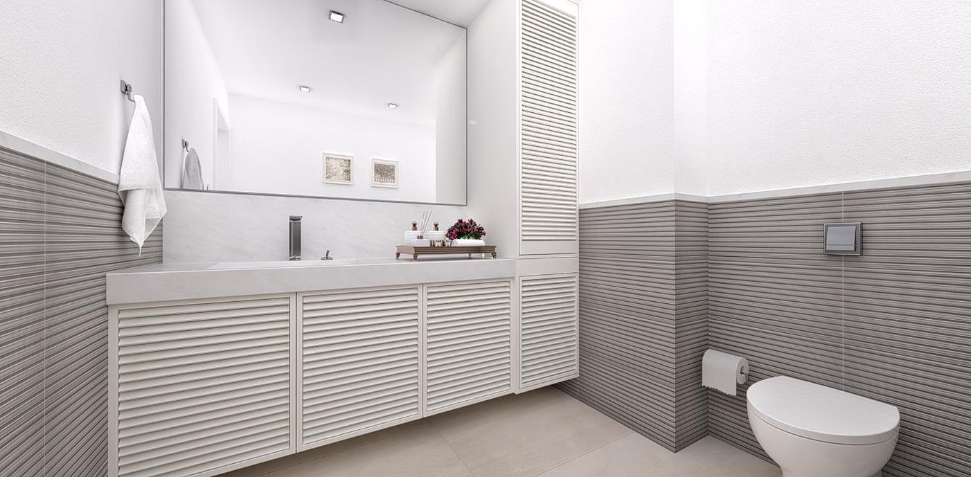 WC de clínica médica com tanque embutido no armário