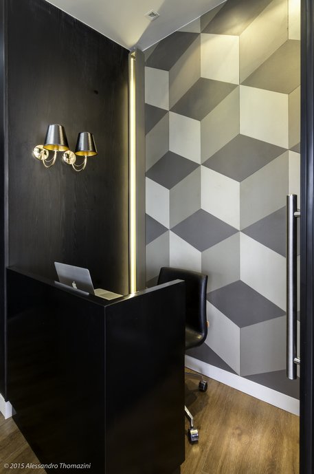 Projeto de escritório de advocacia. Com tons sóbrios e atmosfera Contemporanea este ambiente foi valorizado com o revestimento da linha Mineral Mos 3D.