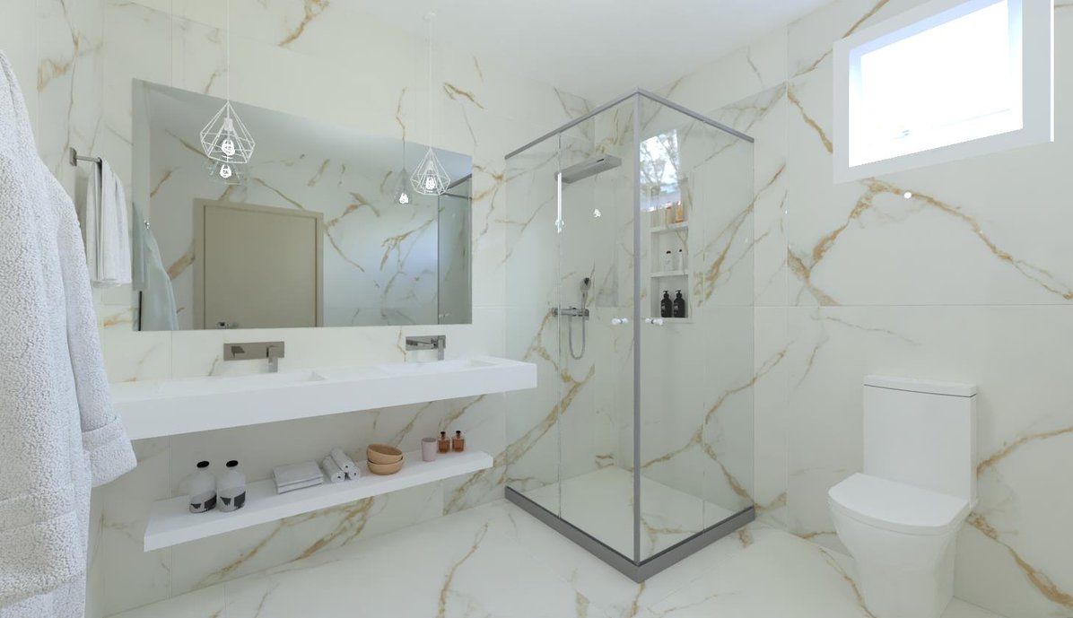 Projeto de um banheiro clean, sofisticado. Usamos Oro Bianco do piso às paredes. Os metais cromados e louças brancas. Ficou um encanto, que ai também gostou? 