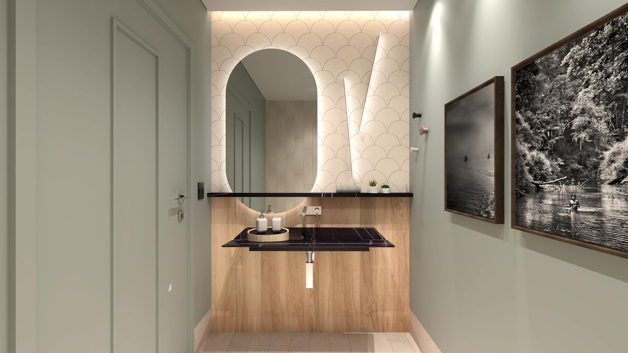 O lavabo do espaço corporativo, conta com elementos marcantes do portfólio Portobello. Sua cuba Ícaro, assinada pelo designer Jader Almeida dá contraste e elegância para o espaço. A linha pavone, aplicada na parede, traz a curva como elemento complementar, em harmonia com o espelho oval e as peças Punto, da Officina Portobello. O piso e a parede do fundo do ambiente são revestidos no porcelanato Berliner Sand e a meia parede da bancada no Araucária Clara Touch.