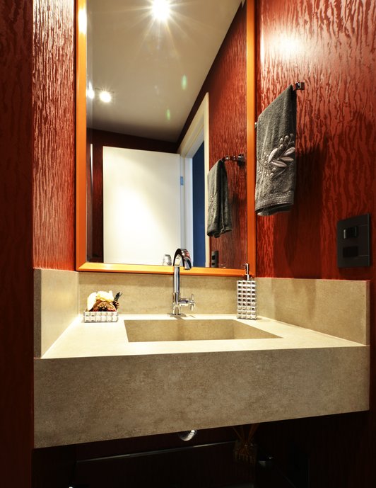 Lavabo de apartamento Loft com Bancada em cuba esculpida em porcelanato Concretissyma Matiz Grigio 60x1,20.