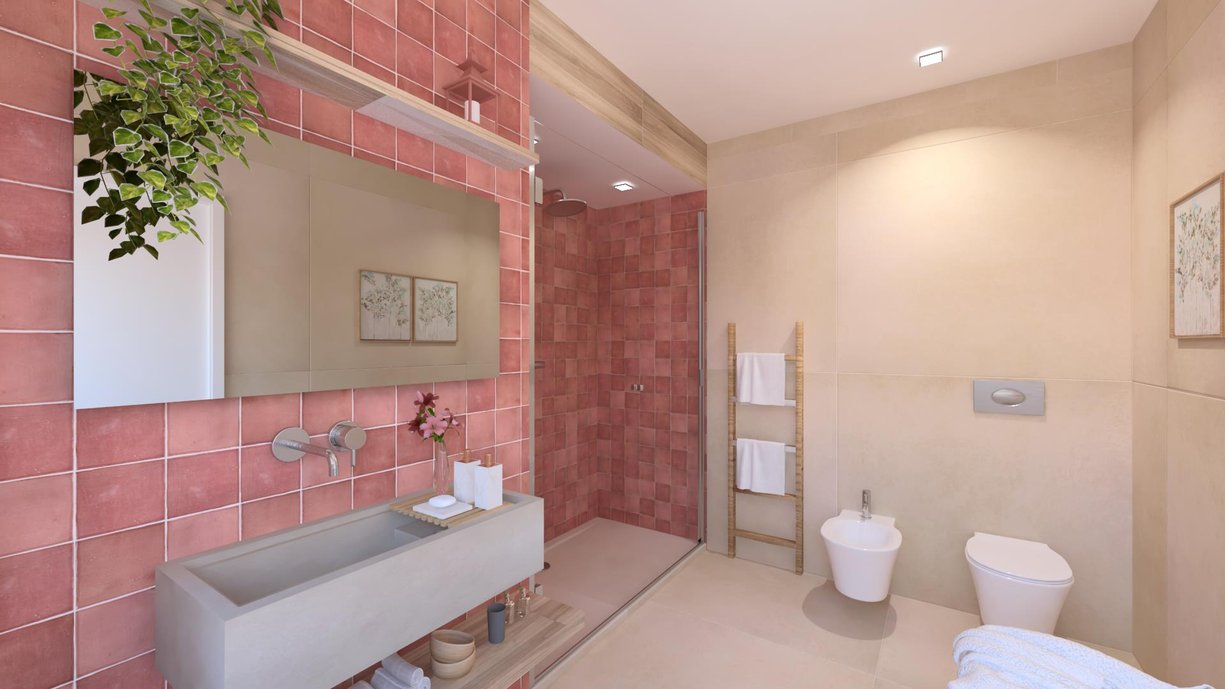 Casablanca Rose 12,5x12,5 nas paredes do box e na parede da bancada. Dansk Cemente White no piso e demais paredes. Estilo artesanal da esmaltação da terracota em uma paleta de cores primárias. 