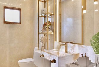 Lavabo Dourado da área de Lazer com Piscina